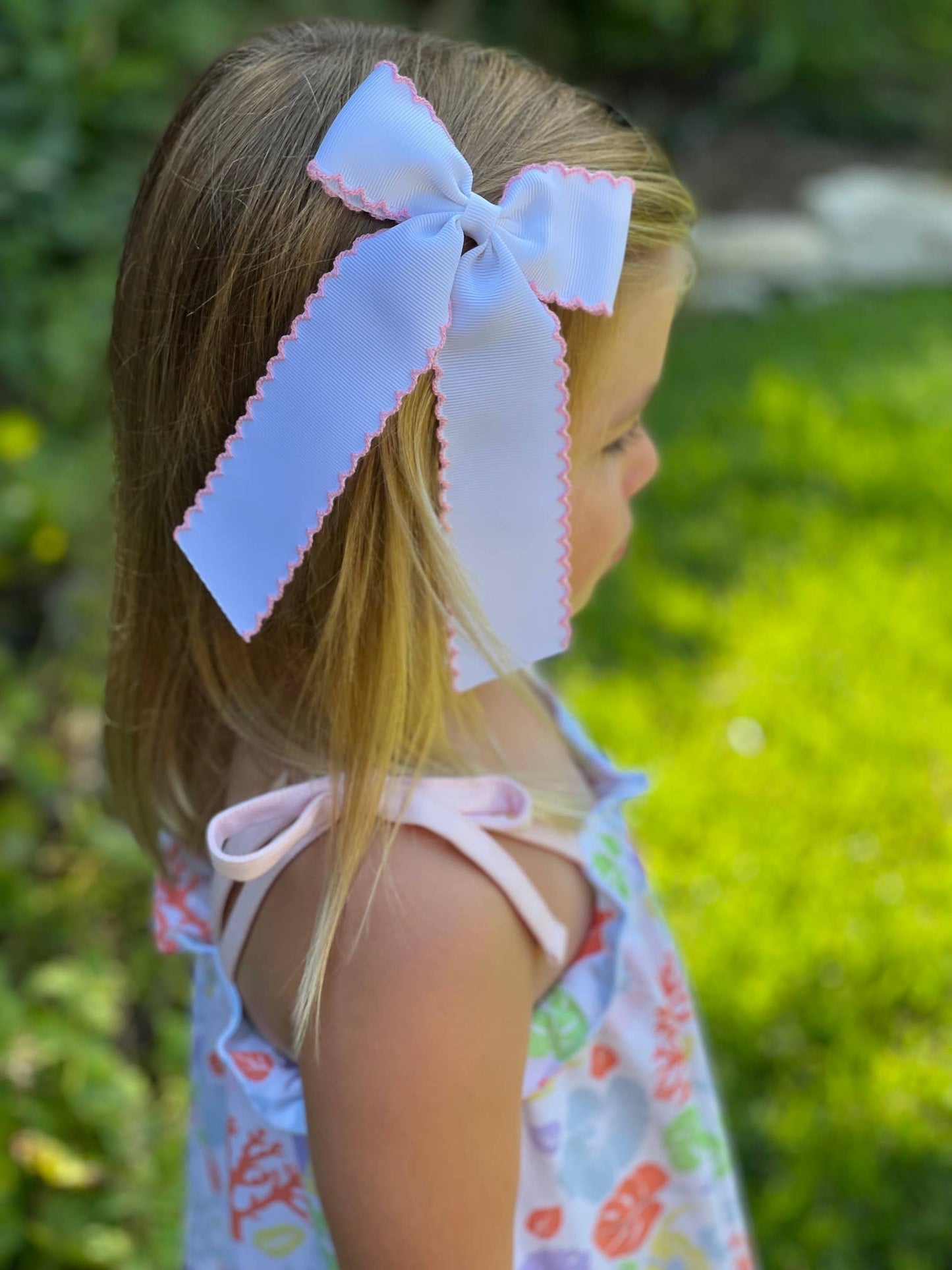 White grosgrain with Blue Moonstitch Long Tail Bow